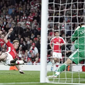 Bendtner's Brilliant Strike: Arsenal's 2-1 Victory Over Liverpool in Carling Cup