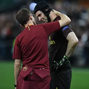 Bittersweet End: Cech Consoled by Garcia after Arsenal's Europa League Defeat to Chelsea