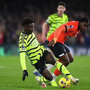 Bukayo Saka vs Teden Mengi: Intense Battle in Luton Town vs Arsenal FC, Premier League 2023-24