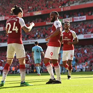 Celebrating Victory: Lacazette and Bellerin Rejoice After Arsenal's Second Goal vs Burnley (2017-18)