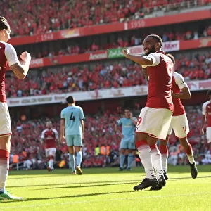 Celebrating Victory: Lacazette and Bellerin's Unforgettable Moment at Arsenal vs. Burnley (2017-18)
