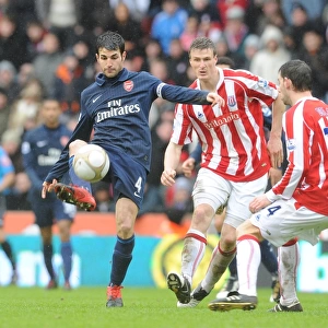 Cesc Fabregas (Arsenal) Robert Huth and Rory Delap (Stoke). Stoke City 3: 1 Arsenal