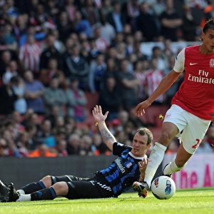 Chamakh's Brace: Arsenal Triumph Over Stoke in Premier League Clash (3-1)