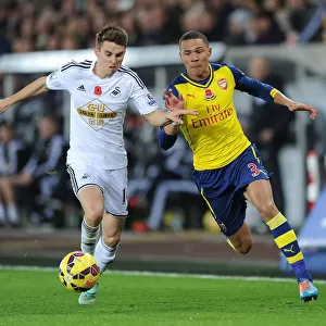 Clash at Liberty: Gibbs vs Carroll in Swansea v Arsenal Premier League Showdown
