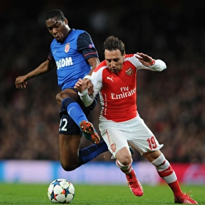 Clash of Midfield Titans: Cazorla vs Kondogbia in Arsenal's UEFA Champions League Battle against Monaco