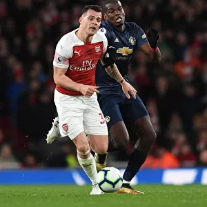Clash of Midfield Titans: Xhaka vs Pogba - Arsenal vs Manchester United, Premier League
