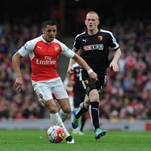 Clash of the Midfielders: Alexis Sanchez vs. Ben Watson in Arsenal's Battle Against Watford