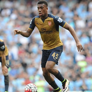 Clash in the Premier League: Alex Iwobi's Determined Performance Against Manchester City (May 2016)