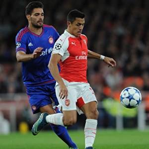 Clash of Stars: Alexis Sanchez vs. Alberto Botia in Arsenal's Champions League Battle against Olympiacos