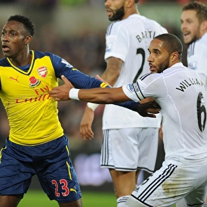 Clash of Titans: Welbeck vs. Williams in Swansea's Battle Against Arsenal