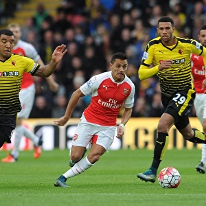 Clash at Vicarage Road: Sanchez vs Capoue and Deeney - Arsenal's Star Forward Tangles with Watford Duo