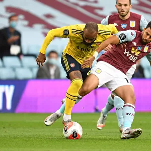 Clash at Villa Park: Lacazette vs. Trezeguet in Intense Aston Villa vs. Arsenal FC Premier League Showdown