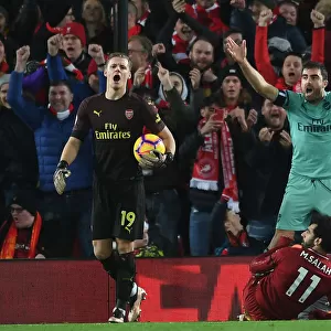 Controversial Penalty Call: Sokratis and Leno Protest as Mo Salah Scores for Liverpool Against Arsenal