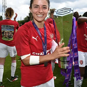 Danielle van de Donk Lifts the WSL Trophy: Arsenal Women Celebrate Championship Win over Manchester City
