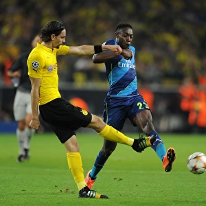 Danny Welbeck vs. Neven Subotic: Intense Battle in Borussia Dortmund vs. Arsenal UEFA Champions League Clash