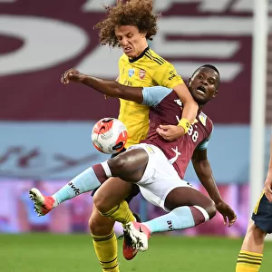 David Luiz vs. Mbwana Samatta: Intense Clash in Aston Villa vs. Arsenal FC Premier League Match