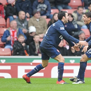 Denilson celebrates scoring the Arsenal goal with Cesc Fabregas. Stoke City 3: 1 Arsenal
