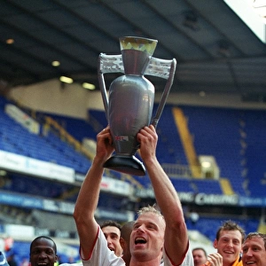 Dennis Bergkamp's Triumph: Arsenal Wins the Premier League at White Hart Lane, 2004