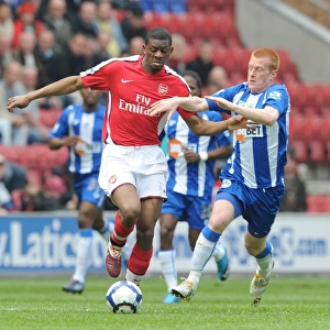 Diaby vs Watson: Wigan's Upset Over Arsenal in FA Premier League (3-2)