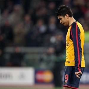 Eduardo (Arsenal) walks away having missed his penalty