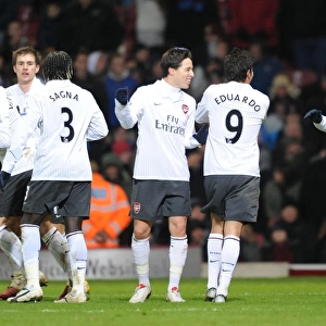 Eduardo celebrates scoring the 2nd Arsenal goal with Samir Nasri and Carlos Vela