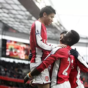 Eduardo, Eboue, and Vela: Triumphant Celebration of Arsenal's 3-0 FA Cup Victory over Burnley