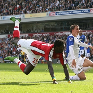 Emmanuel Adebayor heads past Paul Robinson to score