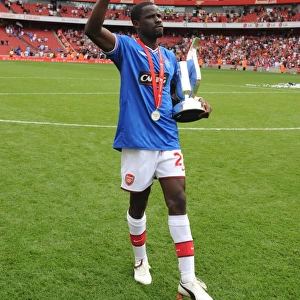 Emmanuel Eboue (Arsenal) with the Emirates Cup Trophy