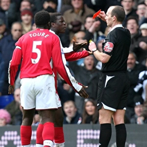 Emmanuel Eboue (Arsenal) is shown the Red Card by referee Mike Dean