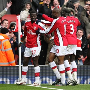 Emmanuel Eboue celebrates scoring the 3rd Arsenal goal