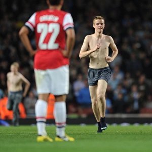 Fan Storms Arsenal Pitch During Capital One Cup Match vs Coventry City