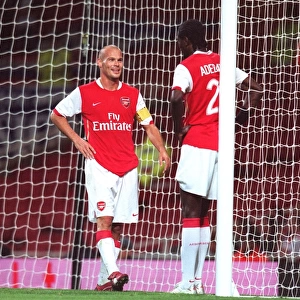 Freddie Ljungberg and Emmanuel Adebayor (Arsenal)