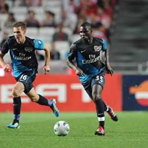 Frimpong and Ramsey: Arsenal's Midfield Duo Shine in Pre-Season Friendly Against Benfica (2011)