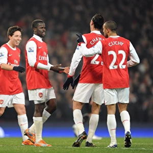 Gael Clichy celebrates scoring the 5th Arsenal goal with Marouane Chamakh