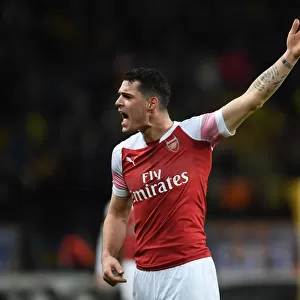 Granit Xhaka in Action: Arsenal's Europa League Battle against BATE Borisov