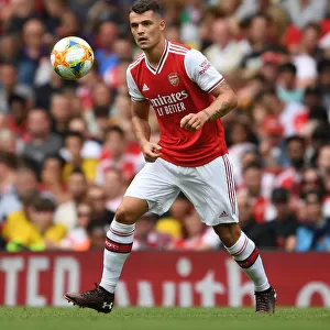 Granit Xhaka: Arsenal's Midfield Maestro Shines in Emirates Cup Clash Against Olympique Lyonnais