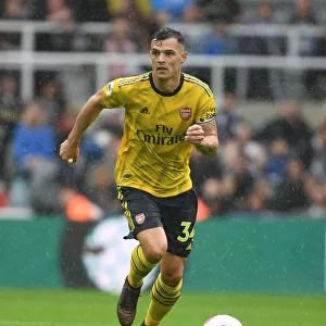Granit Xhaka's Dominating Midfield Performance: Arsenal's Victory over Newcastle United