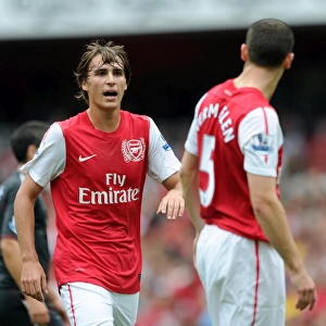 Ignasi Miquel and Thomas Vermaelen (Arsenal). Arsenal 0: 2 Liverpool. Barclays Premier League
