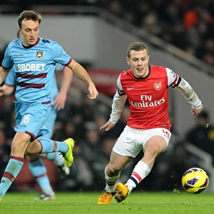 Intense Rivalry: Jack Wilshere vs. Mark Noble Battle in Arsenal vs. West Ham Showdown