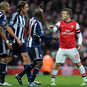 Intense Rivalry: Wilshere vs. Reid, Olsson, and Mulumbu Clash in Arsenal vs. West Bromwich Albion Showdown