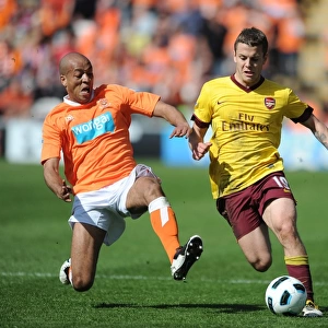 Jack Wilshere (Arsenal) Alex Baptiste (Blackpool). Blackpool 1: 3 Arsenal