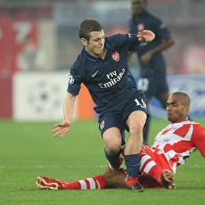 Jack Wilshere (Arsenal) Leonardo (Olympiacos). Olympiacos 1: 0 Arsenal, UEFA Champions League