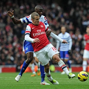 Jack Wilshere (Arsenal) Samba Diakite (QPR). Arsenal 1: 0 Queens Park Rangers