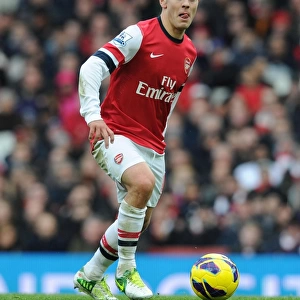 Jack Wilshere: Midfield Mastermind in Action for Arsenal vs. Queens Park Rangers, 2012-13