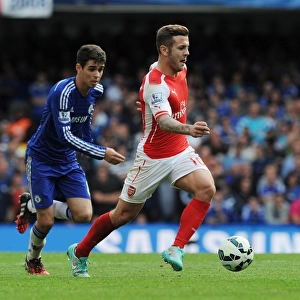 Jack Wilshere vs. Oscar: Battle in the Heart of the Premier League Clash Between Chelsea and Arsenal (2014-15)