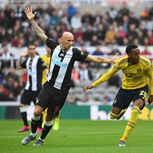 Joe Willock vs Jonjo Shelvey: Intense Battle in Newcastle United vs Arsenal FC Premier League Clash