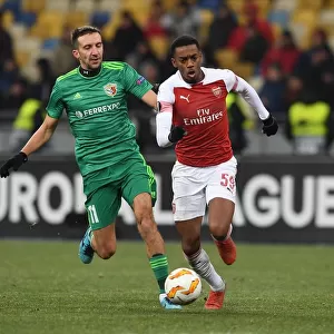 Joe Willock vs. Vyacheslav Sharpar: Arsenal Star Clashes with Vorskla Player in Europa League Match