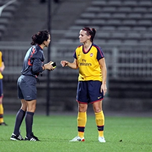 Julie Fleeting (Arsenal) with the referee