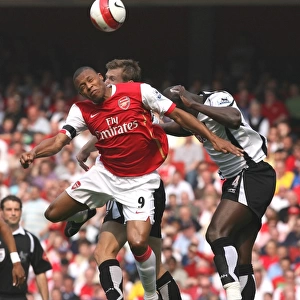 Julio Baptista (Arsenal) Papa Bouba Diop and Brian McBride (Fulham)