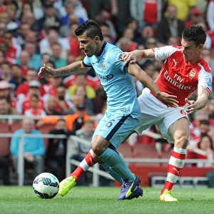 Laurent Koscielny (Arsenal) Sergio Aguero (Man City). Arsenal 2: 2 Manchester City